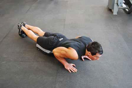 like a plank throughout the movement Lower yourself down until your chest