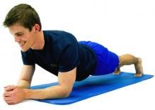 Plank Lie face down on a comfortable surface.