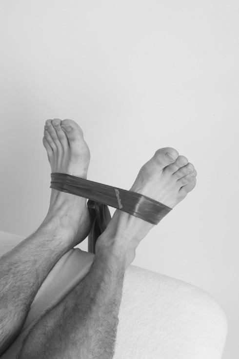 Case studies 3 Treatment and Rehabilitation Fig 3.15 Ankle eversion strengthening exercises with theraband.