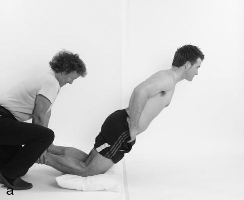 Case studies 3 Treatment and Rehabilitation Fig 3.21 Nordic drills showing (a) start and (b) mid position.