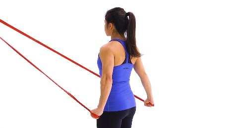 Shoulder External Rotation Reactive Isometrics Begin standing upright with your elbow bent at a 90-degree angle and a towel roll tucked under your upper arm, holding a resistance band that is