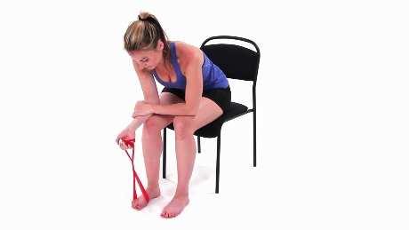 STEP 3 Wrist Flexion with Resistance Begin sitting in a chair with your elbows resting on your knees, and a resistance band