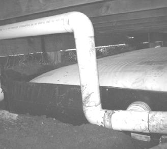 There must be no cross connection between the overflowing water and water being delivered to the bladder. The overflow pipe work must allow the unrestricted flow of rainwater to the stormwater outlet.