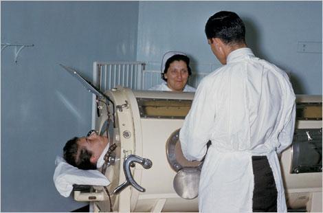 Patient in iron lung, Rhode