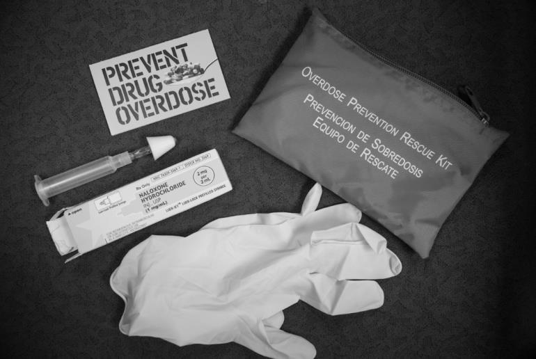 prevention with Naloxone means