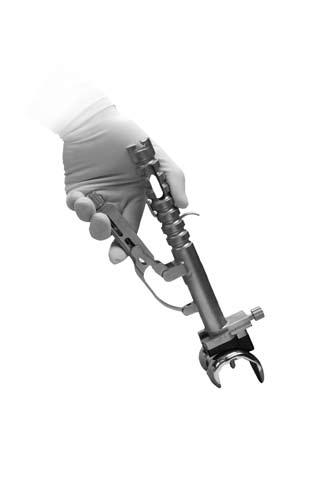 Align implant or provisional onto prepared bone, impact end (H). Open locking handle by pressing trigger (E) to release instrument from implant or provisional.