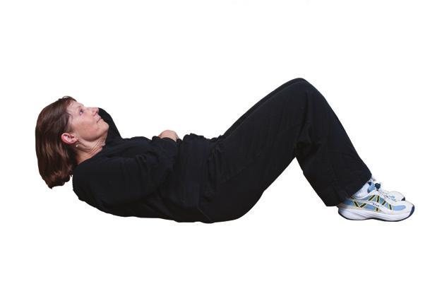 Complete this exercise on the floor with your feet elevated (more back support) or lying on the floor.