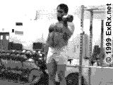 ht. 9. Starting position: Stand straight with feet shoulder width apart. You should be holding a dumbbell in each hand. The dumbbells should be perpendicular to your body.