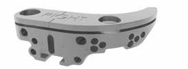 Tibial slotted cutting block - right side Tibial unslotted cutting block holes (right knee) Parallel positioning holes Oblique fixation holes Tibial stylus holes Compatible holes After pre-drilling,
