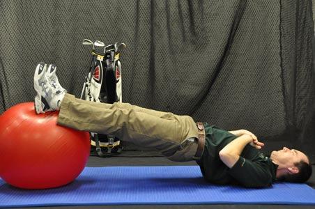 Supine Bridge No Arms This is an advanced lower body and core stability exercise designed to target the glutes.