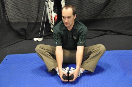 Allow both knees to fall gently to the floor. While doing so, bend slowly forward from the hips with an erect spine angle.
