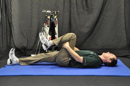 Bring your left knee up towards your chest until your thigh is perpendicular to the floor.
