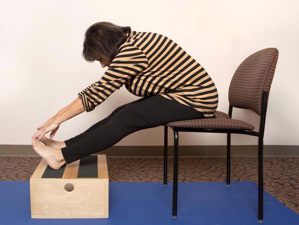 Staff Position VGY Sit toward front of chair, your back away from back of chair. Stretch legs forward onto the floor, blocks or small stool. Bend feet (Bring toes upward).