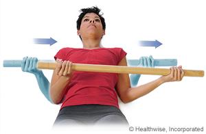 Note: To make a wand for this exercise, use a piece of PVC pipe or a broom handle with the broom removed. Make the wand about 30 centimetres wider than your shoulders.