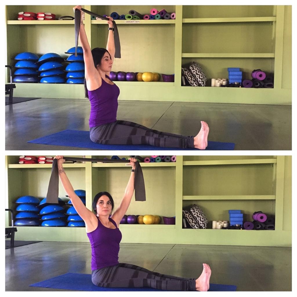 Band Side Twist Holding an exercise/stretch band in both hands, extend arms straight up overhead.