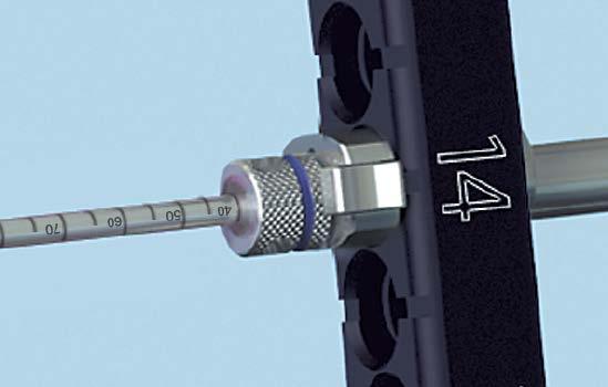 Insert 4.0 mm or 5.0 mm Locking Screws Thread the handle into an appropriate percutaneous drill guide. For 4.0 mm locking screws, use the 3.2 mm percutaneous threaded drill guide For 5.