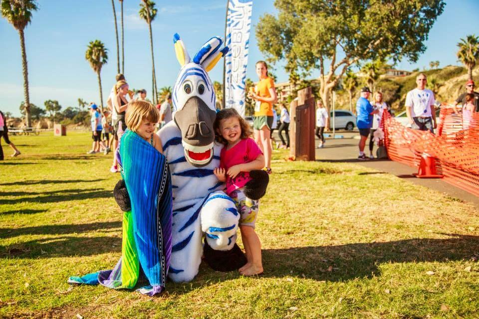 The Family Fun Run will take place at the race s starting line and will be a short sprint chasing our very own blue striped zebra, Zee!