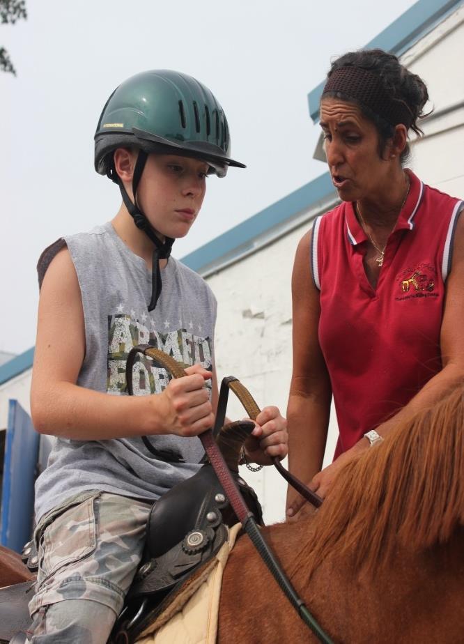 Therapy vs Adaptive Riding Adaptive riding is an equineassisted activity with the purpose of contributing positively to the cognitive, physical, emotional, and social well-being of individuals with