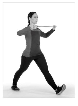 Keeping your back and neck straight, take a large step straight forward and bend your front knee to lower your body.