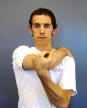 Posterior Capsule Stretch Place the hand of the target arm over the opposite shoulder as shown.