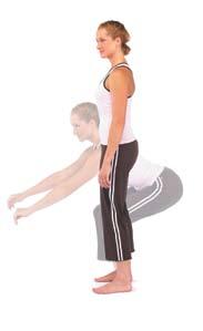 10 Standing warm-up stretches Roll Up Stand with feet facing directly forward and hip distance apart. Bend your knees slightly.
