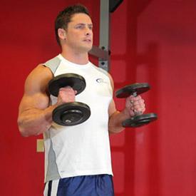 Now, while holding your upper arm stationary, exhale and curl the weight forward while contracting the biceps.