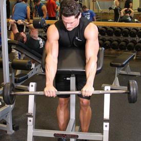 REVERSE GRIP BARBELL PREACHER CURLS 1. Grab an Barbell using a shoulder width and palms down (pronated) grip. 2.