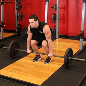 DEADLIFT 1. Stand in front of a loaded barbell. 2. While keeping the back as straight as possible, bend your knees, bend forward and grasp the bar using a medium (shoulder width) overhand grip.