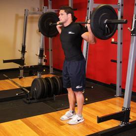 BARBELL LUNGE 1. This exercise is best performed inside a squat rack for safety purposes. To begin, first set the bar on a rack just below shoulder level.