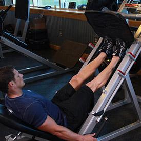 (Note: In some leg press units you can leave the safety bars on for increased safety. If your leg press unit allows for this, then this is the preferred method of performing the exercise.