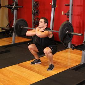 Rest the bar on top of the deltoids and cross your arms while grasping the bar for total control. 2.