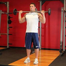 STANDING BARBELL MILITARY PRESS 1. Start by placing a barbell that is about chest high on a squat rack.