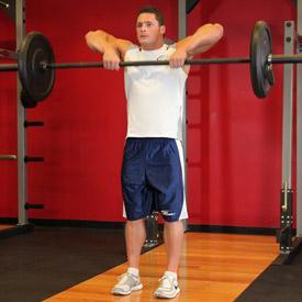 UPRIGHT BARBELL ROW 1. Grasp a barbell with an overhand grip that is slightly less than shoulder width.
