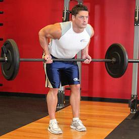 The barbell should hang directly in front of you as your arms hang perpendicular to the floor and your torso. This is your starting position. 3.