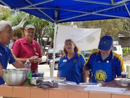 MEET THE LIONS. Lions Clubs in Zone 12 braved the wind and showers to promote Lions awareness during membership month, at Happy Valley Park in Caloundra on Sunday the 11 th of March.