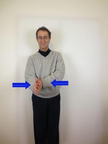 Squeeze shoulder blades together with arms out and elbows at your sides. Squeeze together for a few seconds then relax.