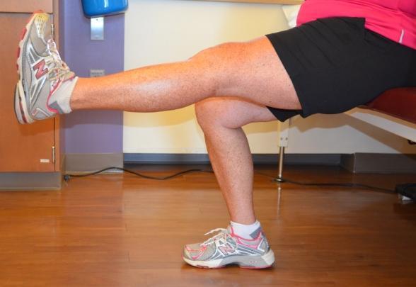 thigh, lift leg 8-10 inches from surface keeping knee straight as possible