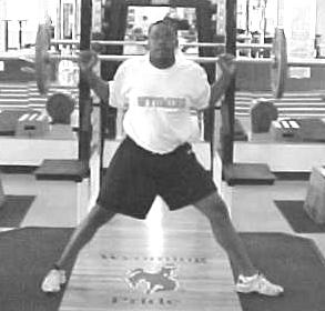 Front Squats Start with feet parallel and slightly wider than shoulder width and toes