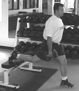 Slowly squat to the right, allowing the left leg to go straight, until the right thigh is