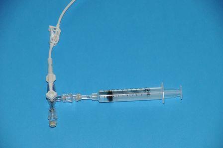 5 cm below the needleless connector using antiseptic swab. Allow to dry. 11.