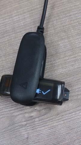 Charging the wrist band: A trick indicates that the battery is fully charged. THIS WRIST BAND IS NOT WATERPROOF!