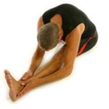 3. As you exhale, lower your torso (with spine straight) as close to the leg as possible. Breathe deeply for 30 seconds.