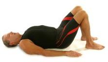 3. MODIFIED BRIDGE POSE (with emphasis on tightening the glutes) Key Acu-Points activated: CV 1,
