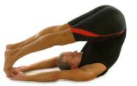 Point and flex both feet then move into the Plow. 1. Start by lying on your back (with head and neck supported with a yoga blanket or rolled towel), legs straight, and hands at side. 2. Inhale deeply.