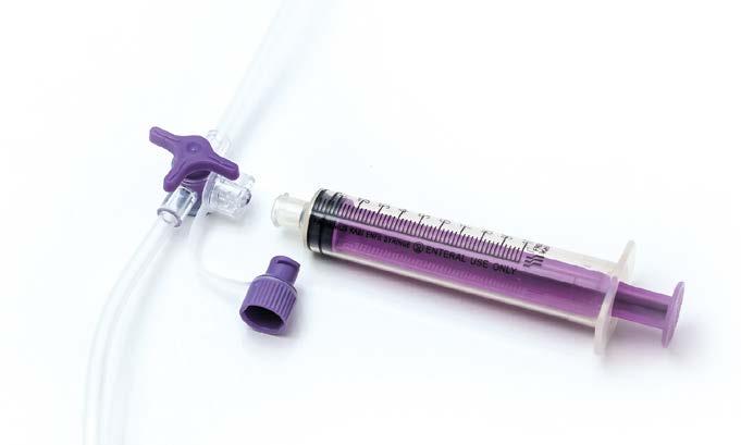 Methods of flushing the tube Using ENFit syringe for flushing. 1. Connect the ENFit syringe to the medication port of the giving set.