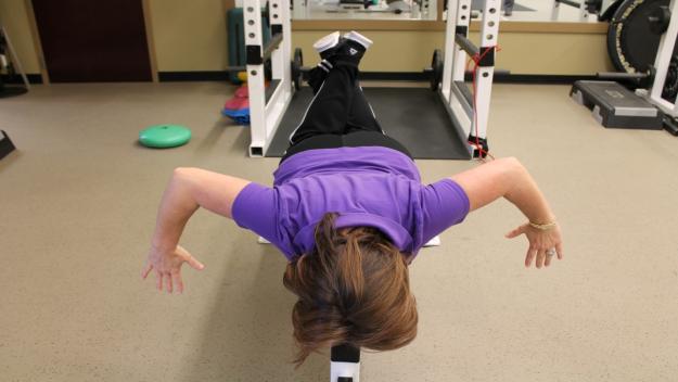 Standing Scapular Retraction in Adduction: With arms elevated and elbows bent to 90degrees, pinch shoulder blades together and press arms back. Hold 5seconds.
