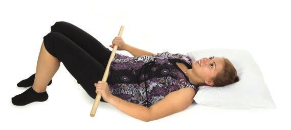 Shoulder flexion with a stick Lying on your back with knees bent; or standing or sitting.