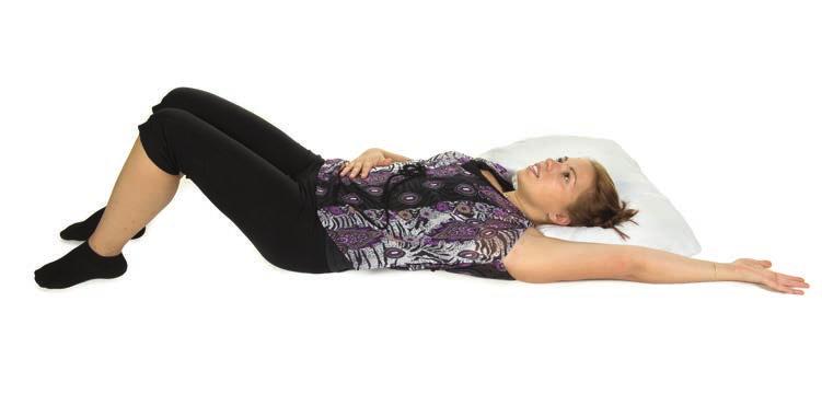 Pectoral stretch Lying on your back with a towel folded under your head and knees bent; or