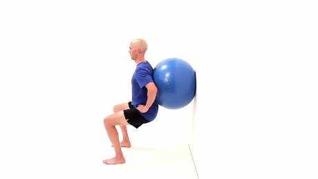 STEP 1 Wall Squat with Swiss Ball Begin standing with a swiss ball between your back and a wall. Slowly bend at your hips and knees, rolling down the wall into a squatting position.