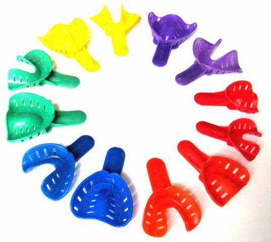 DISPOSABLE IMPRESSION TRAYS Multi-colored Disposable Impression Trays are made of medical-grade polystyrene and numbered and color coded for